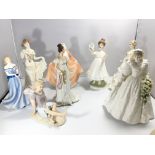 A collection of Worcester and Coalport figures. No