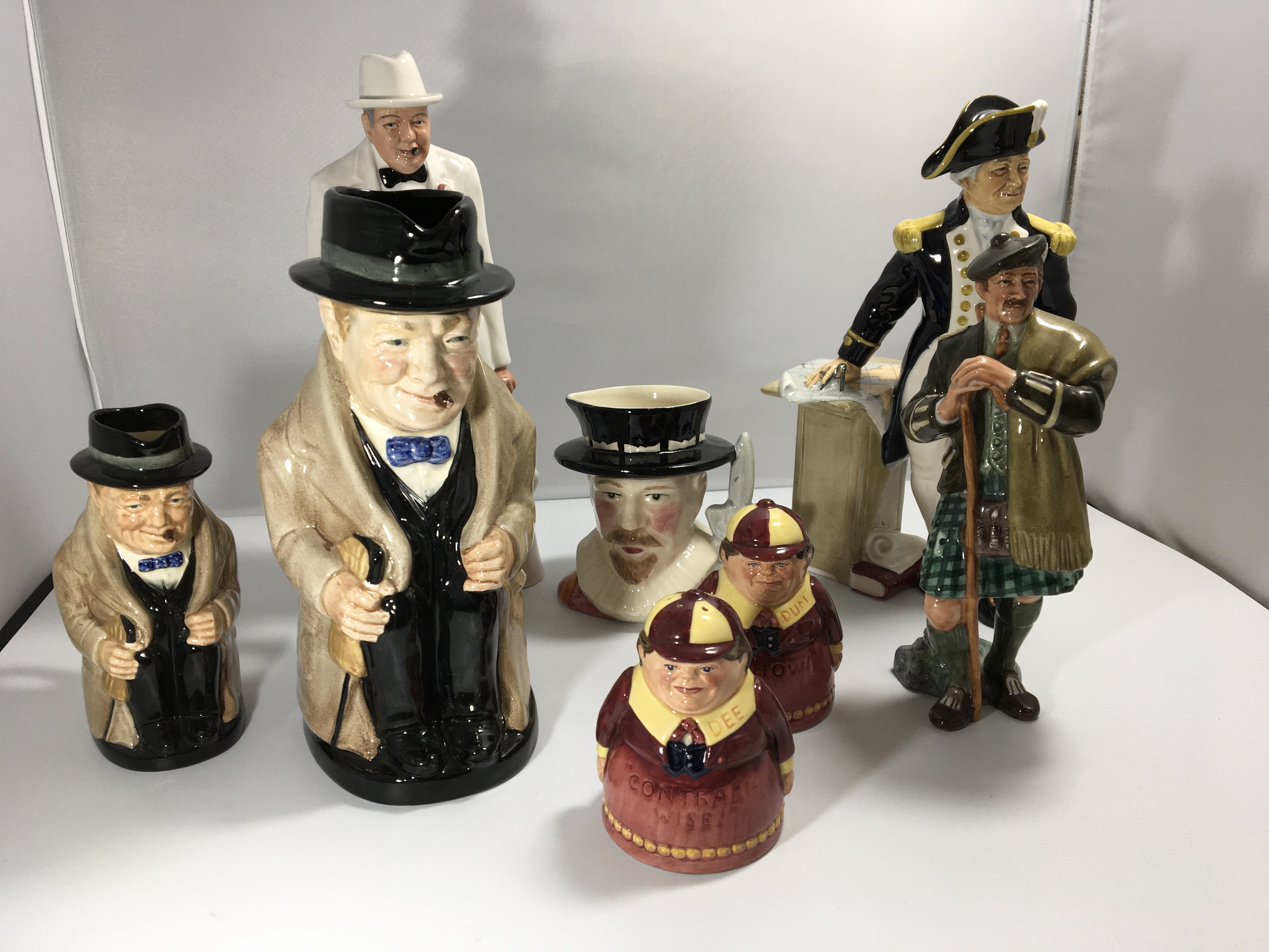 A collection of Royal Doulton figures and characte