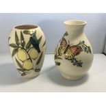 Two Moorcroft vases decorated with lemons and blue