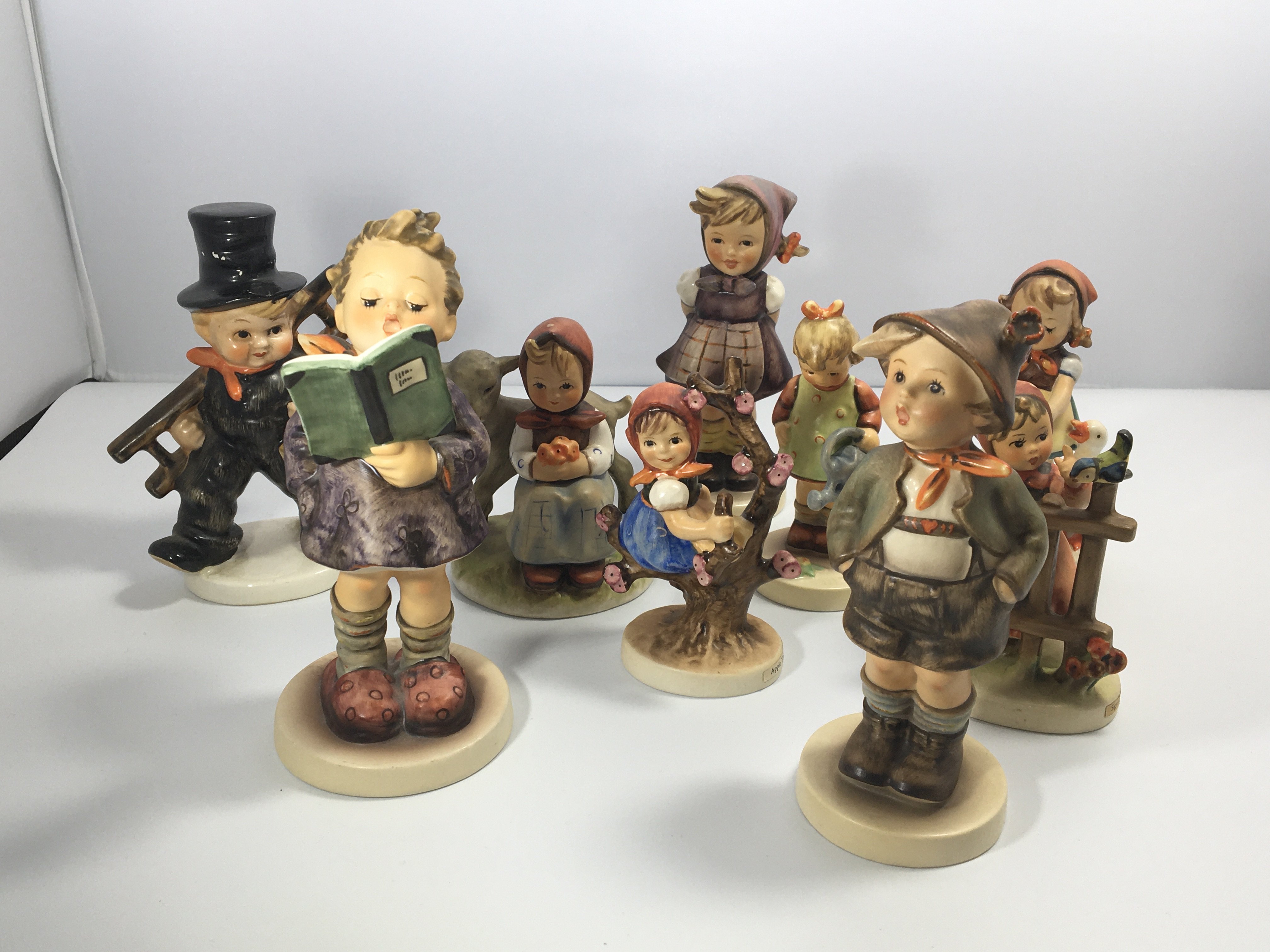 A collection of Goebel Hummel figures (9) no damag