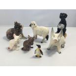 A collection of Beswick figures mice a pig a sheep