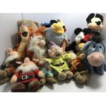 A collection of Disney Store soft figures includin