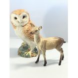 A large Beswick figure of a barn owl height 19cm a