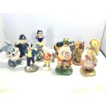 A collection of Beswick Wade and Doulton famous ch