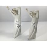 Two Lladro figures of boys in night gowns. Height