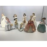 A collection of nine Royal Doulton figures includi