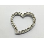A 9ct white gold diamond set heart shaped pendant,