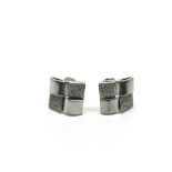 A pair of 18ct white gold diamond earrings, approx