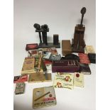 A collection of smoking items including pipes boxe