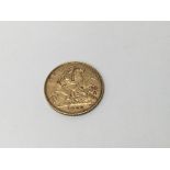 A 1906 gold half sovereign.