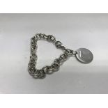 A Tiffany & Co. sterling silver round tag bracelet