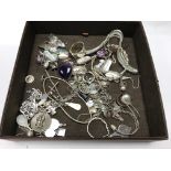 A collection of silver and white metal jewellery.