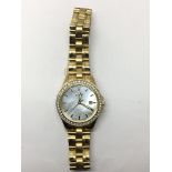 A ladies Citizen eco drive watch with date apertur