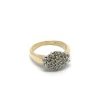 An 18carat yellow gold ring set with a pattern of