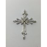 A 9ct white gold diamond cross pendant, approx 1.9