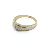 An 18carat gold solitaire diamond ring set weight