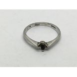 A platinum ring, stone missing, approx 2.6g and ap