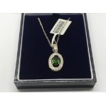 A 9ct white gold Russian diopside and diamond pend