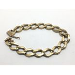 A heavy 9ct gold bracelet, approx 34.4g.