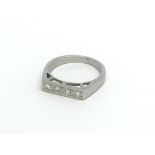 An 18ct white gold four stone diamond ring, approx