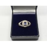 A 9ct white gold tanzanite and diamond ring, appro