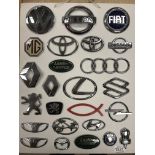 A board of car badges