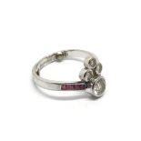 An Art Deco design 18ct diamond and ruby ring, app