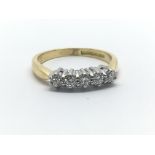 An 18ct yellow gold five stone diamond ring, appro