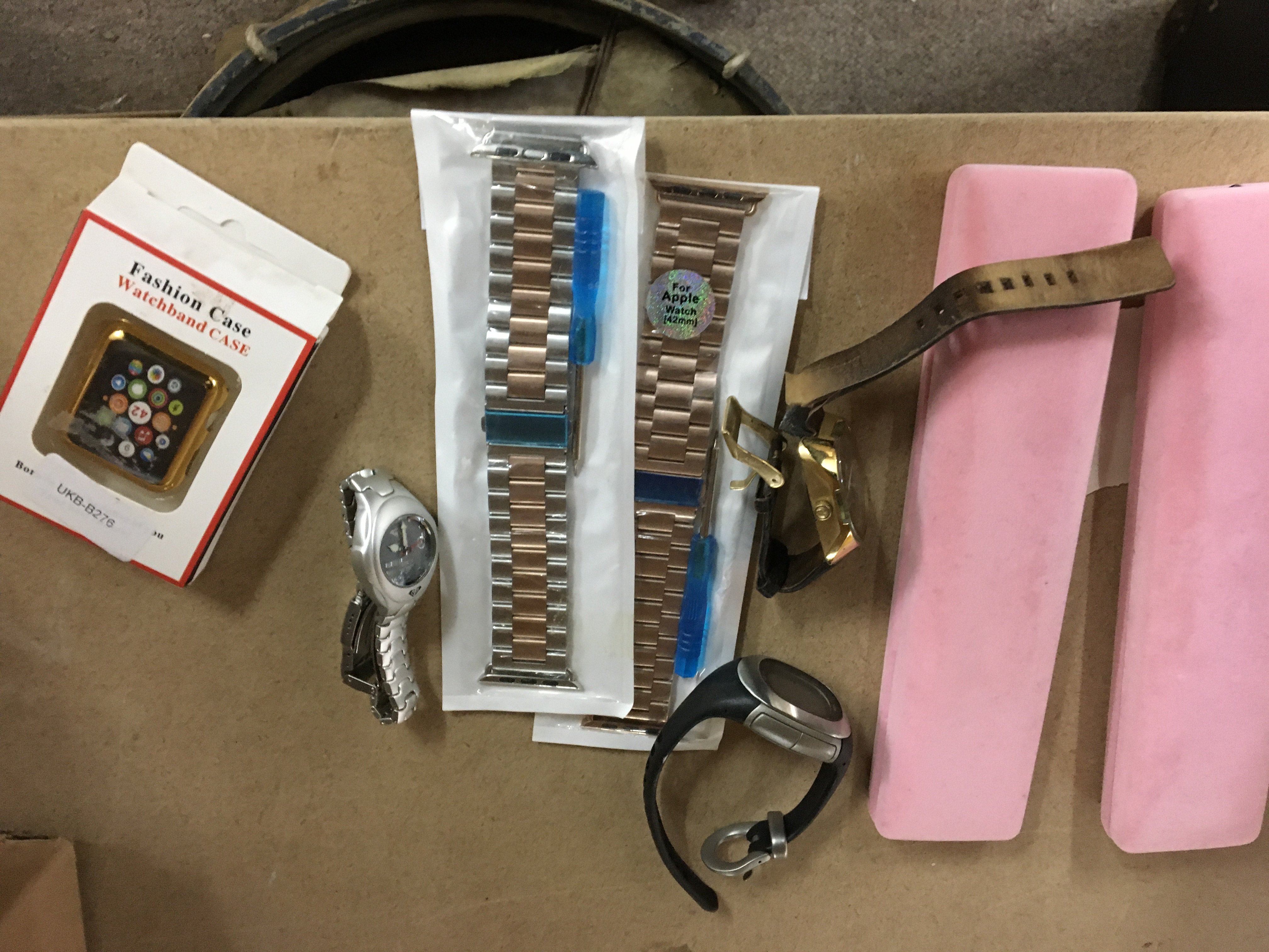 A box of watches and straps various.