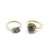 Two 9ct gold rings set with CZs and blue stones, a
