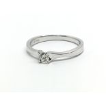 An 18ct white gold and diamond solitaire ring, app