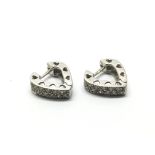 A pair of 18ct white gold diamond clip earrings, a