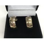 A pair of 9ct gold hoop earrings.