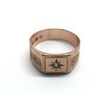 A vintage gents rose gold ring set with a small di