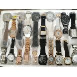 A tray of 20 new ex display watches.