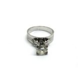 An 18k white gold solitaire diamond ring, approx 3