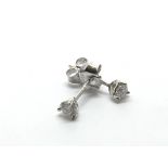 A pair of 18ct white gold diamond earrings, approx