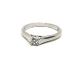 An 18ct white gold and solitaire diamond ring, app