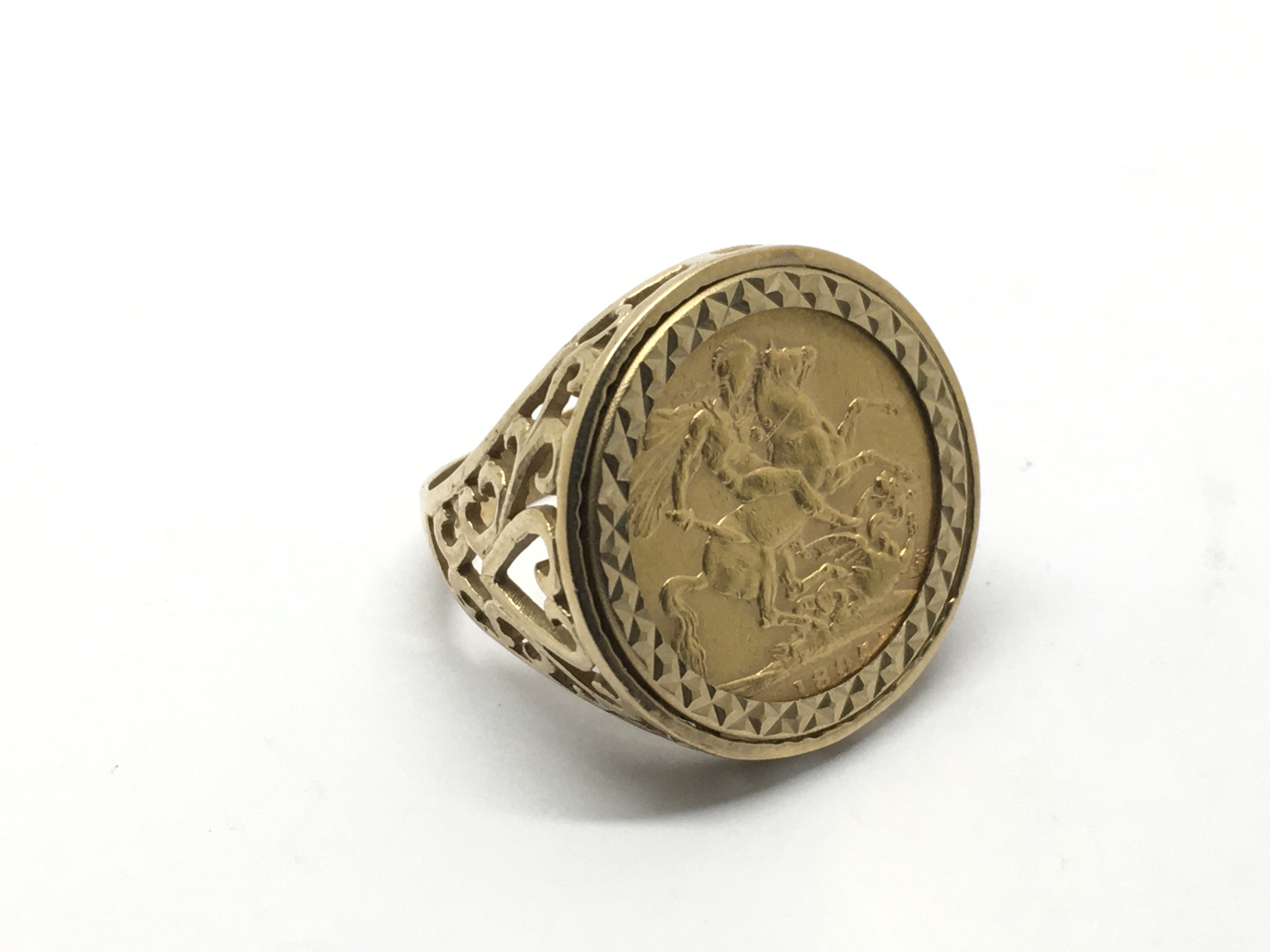 A 9ct gold ring set with an 1895 sovereign, approx