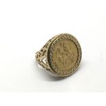A 9ct gold ring set with an 1895 sovereign, approx