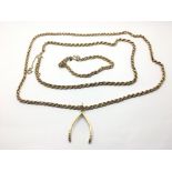 A 9ct gold rope chain with a wishbone pendant plus