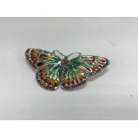 A large silver butterfly brooch inset with marcasi