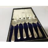 A cased set of silver spoons Sheffield hallmarks.