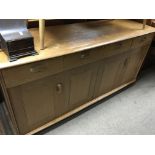 A light oak modern design sideboard fitted with th