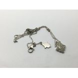 An 18ct white gold diamond pendant on chain, appro