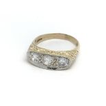 A 9ct gold and CZ gypsy ring, (V), 6.3g.