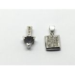 Two 9ct white gold pendants set with diamonds, app