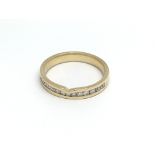 An 18ct yellow gold and 14 Chanel set diamonds, (O