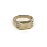 A Gents 14carat gold ring set with three round bri