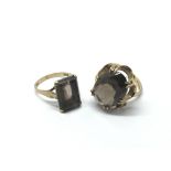 Two 9ct gold rings set with quartz stones, approx
